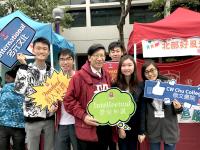 Student ambassadors with Prof Kenneth YOUNG (third from left) at the carnival booth of the College